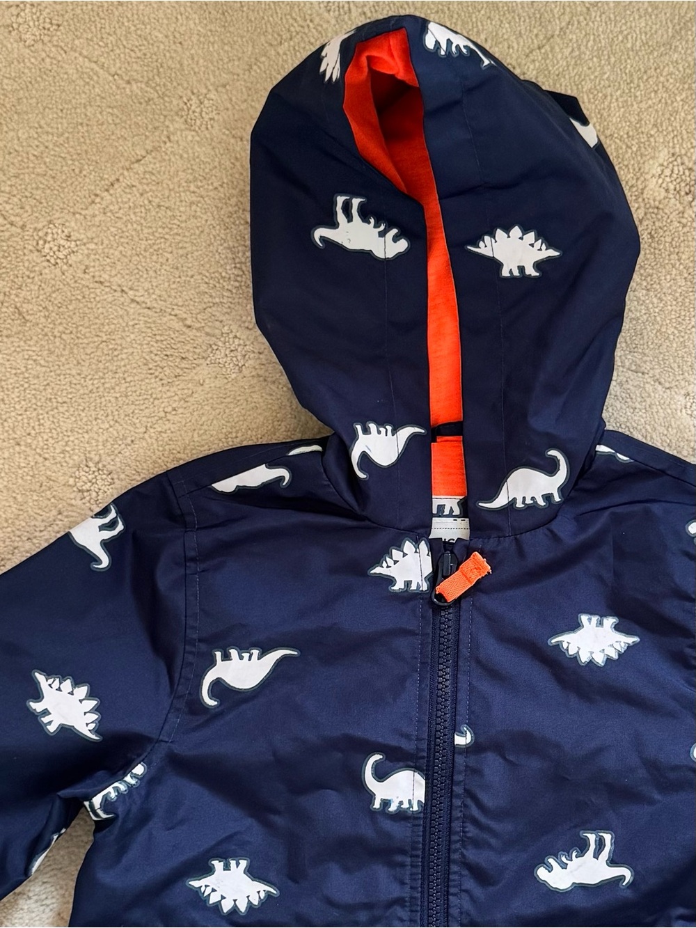 Carters Kids' Navy Dino Hooded Rain Jacket. Dinos change colors when wet!